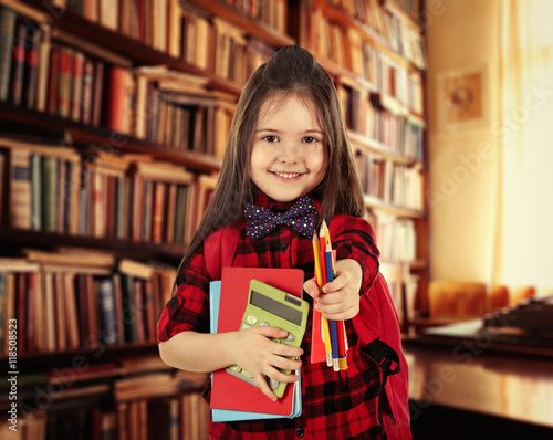 Cute little girl with backp...