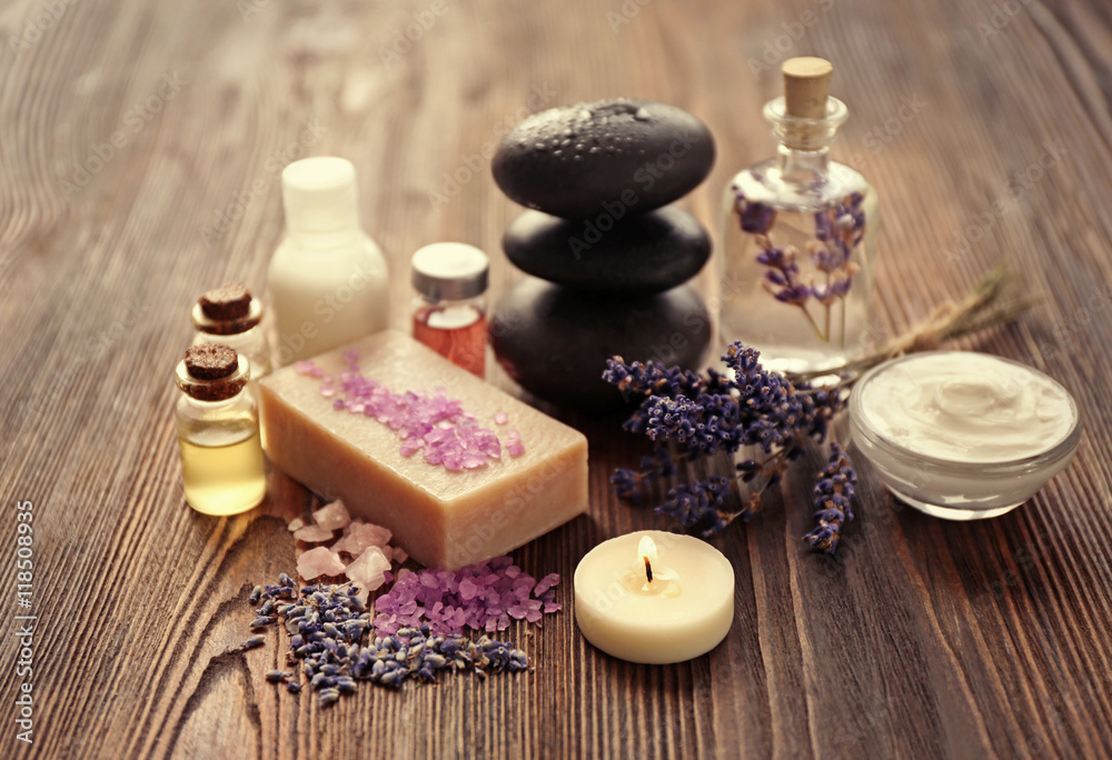 Spa composition with lavender, soap and oil on wooden background Spa composition with lavender, soap and oil on wooden background