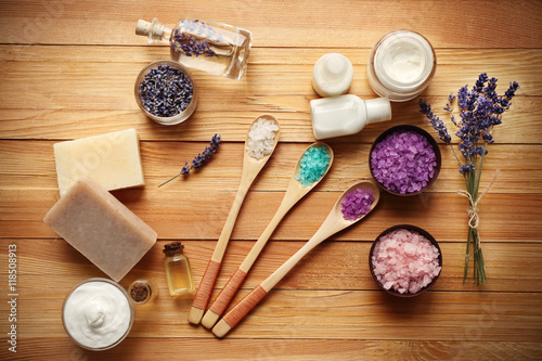 Spa composition with lavender and salt on wooden background
