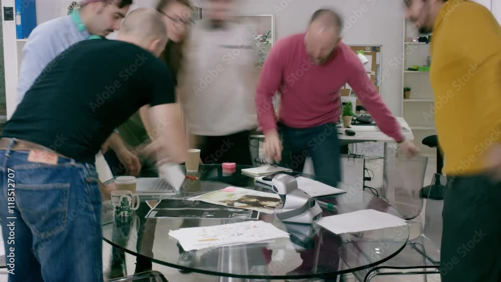 Time lapse of busy creative business team working together in modern office. Time lapse of busy creative business team working together in modern office.