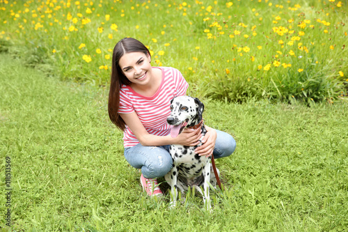 Owner with her dalmatian do...