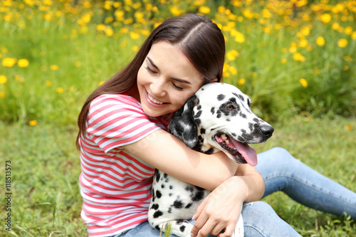 Owner with her dalmatian do...