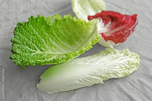 Bild auf Leinwand Various cabbage leaves on table