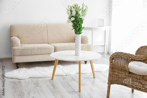 Interior with bouquet of flowers in vase