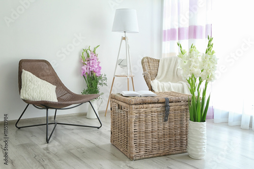 Decorated interior with bouquet of flowers in vase