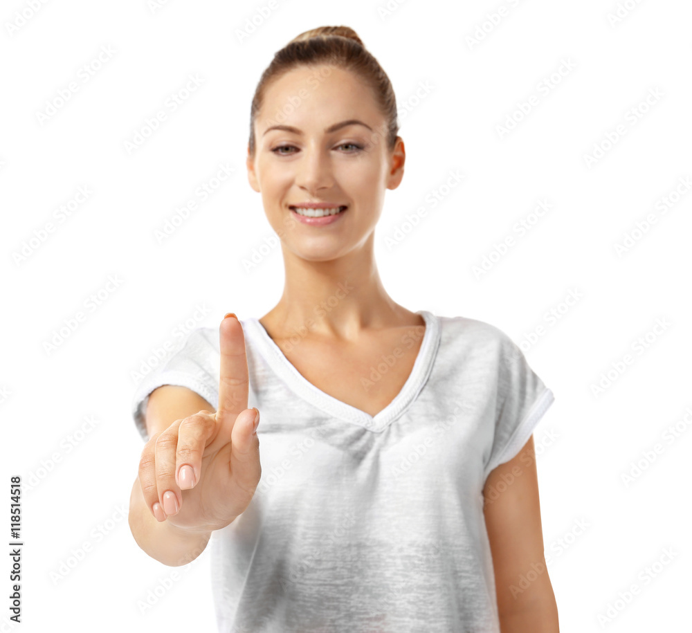 Beautiful girl pointing finger, isolated on white Beautiful girl pointing finger, isolated on white
