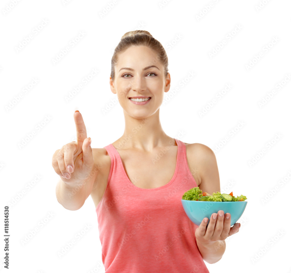 Beautiful girl with salad pointing finger, isolated on white Beautiful girl with salad pointing finger, isolated on white