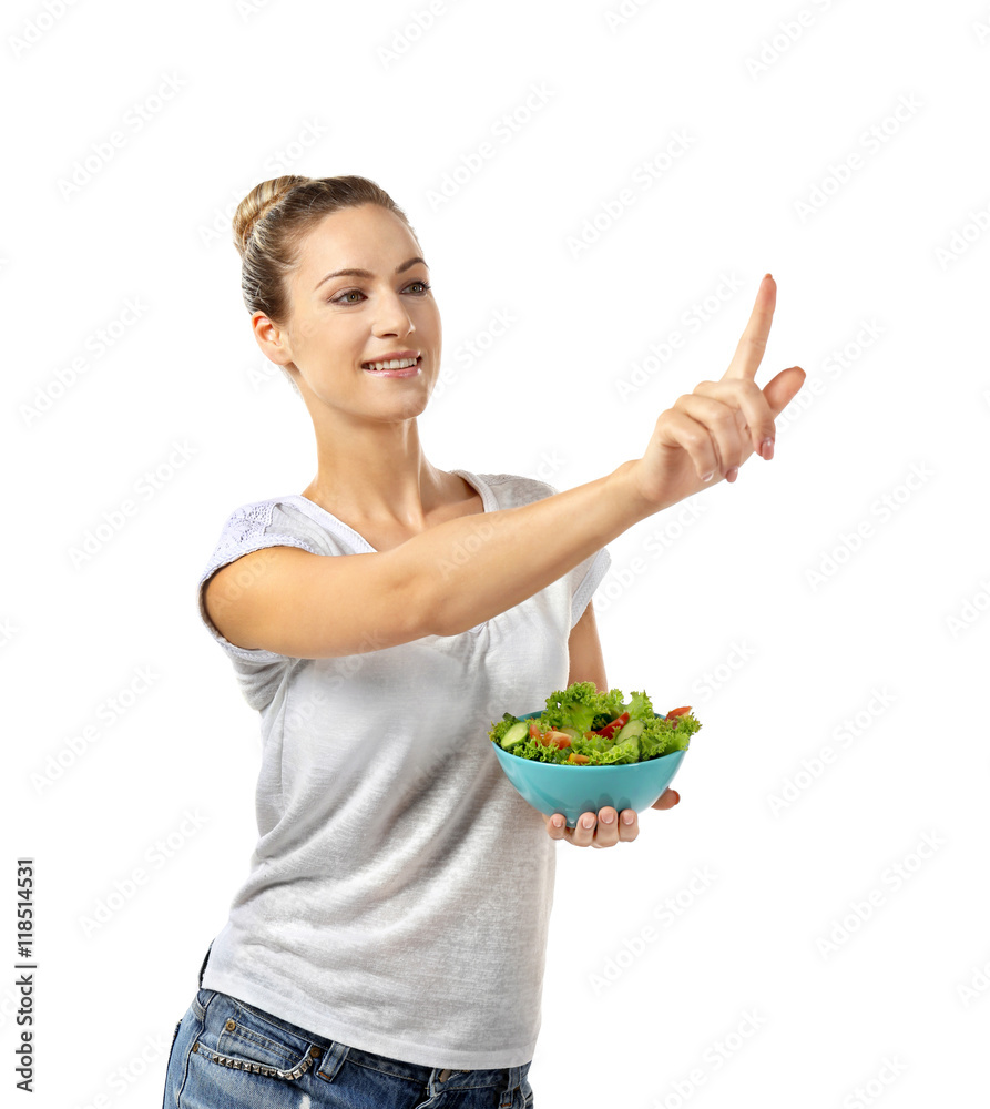 Beautiful girl with salad pointing finger, isolated on white Beautiful girl with salad pointing finger, isolated on white