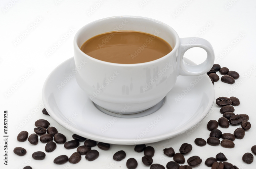 coffee in white cup with coffee beans