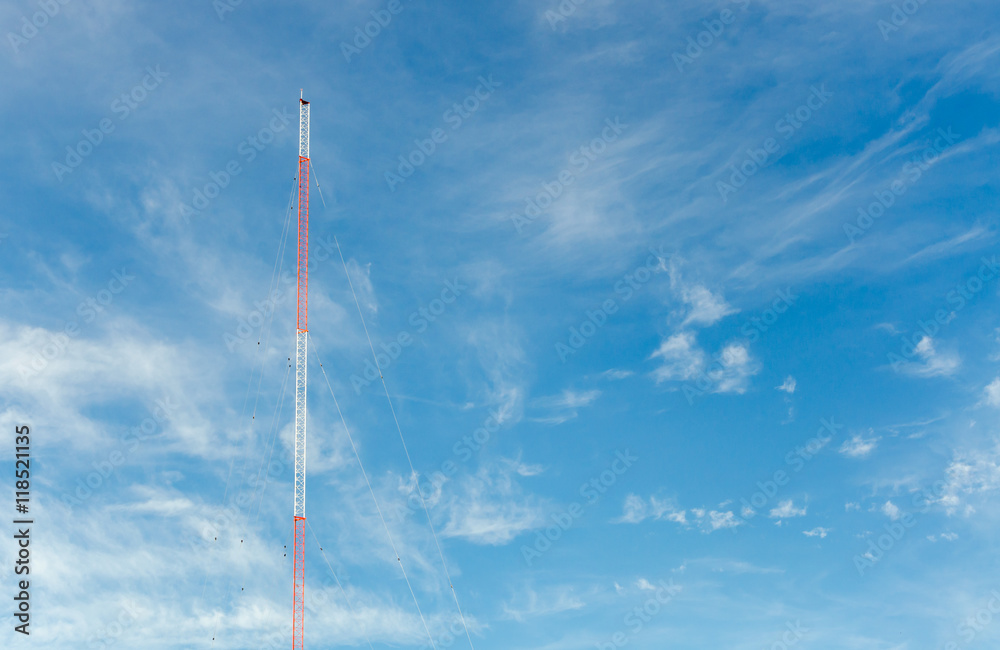 blue sky with clouds and communication towers