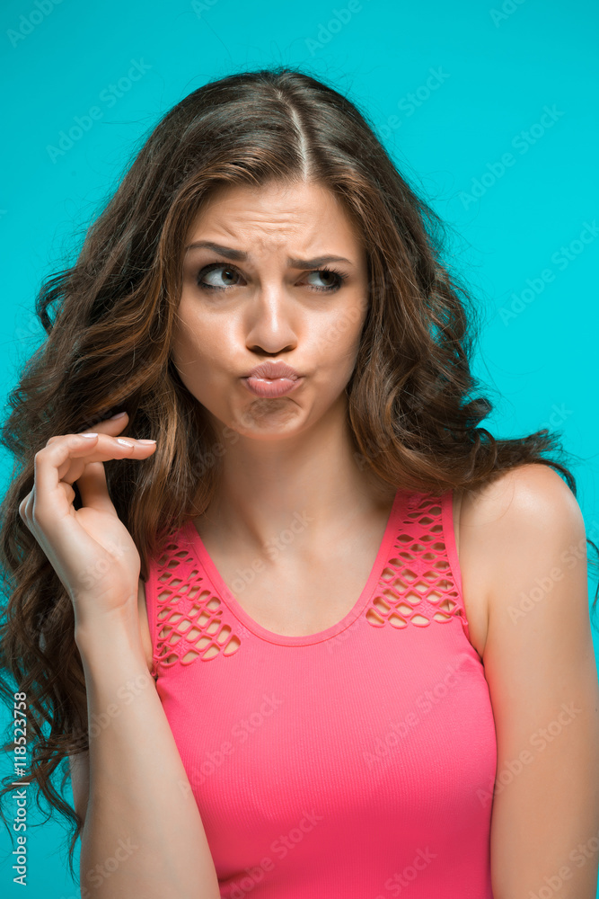 The young woman's portrait with thoughtful emotions The young woman's portrait with thoughtful emotions