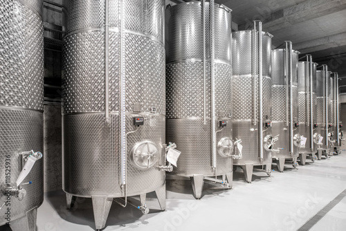 Metal tanks for wine fermentation at the manufacture photo