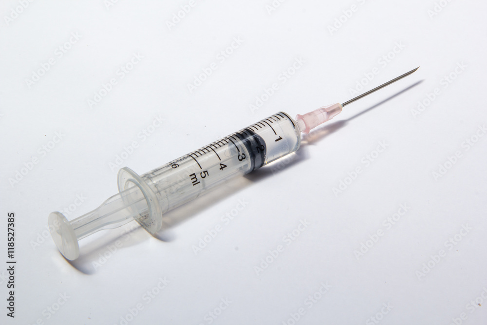 a syringe on white background a syringe on white background