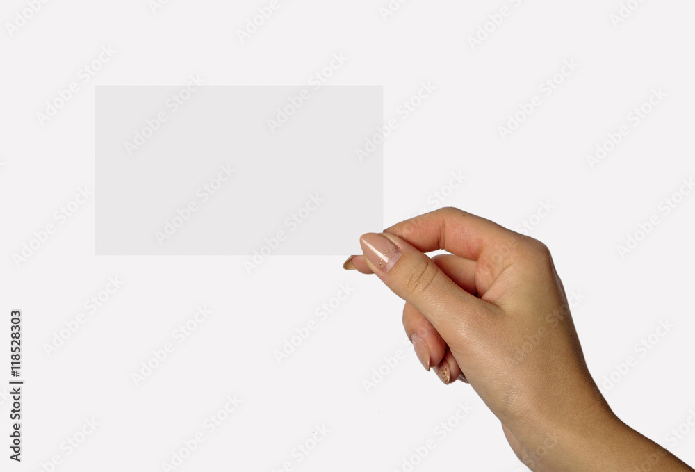 Obraz premium Blank card in woman hand isolated on white background