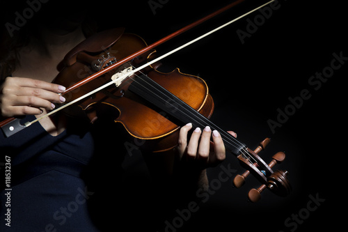 Violinist holding in your hands the violin. 