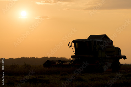 Harvesting machines at work in the field