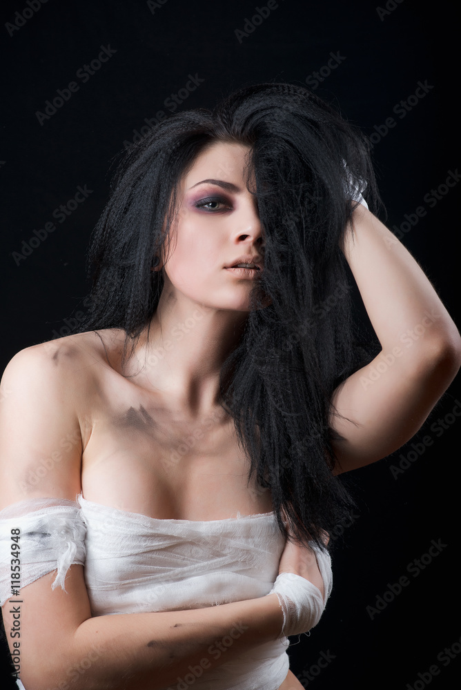 beautiful girl afraid of the ax on black background beautiful girl afraid of the ax on black background