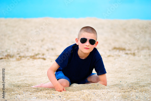 boy sea sand glasses