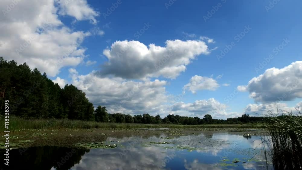 Time lapse clip of white fluffy clouds over blue sky Time lapse clip of white fluffy clouds over blue sky