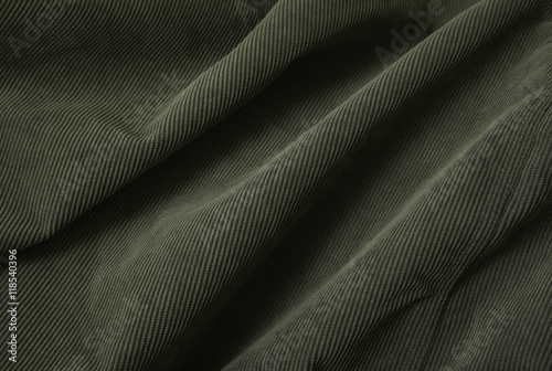 A full page close up of green cord fabric texture