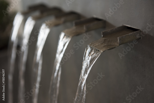 Water Flowing from Wall Fountains © brandtbolding