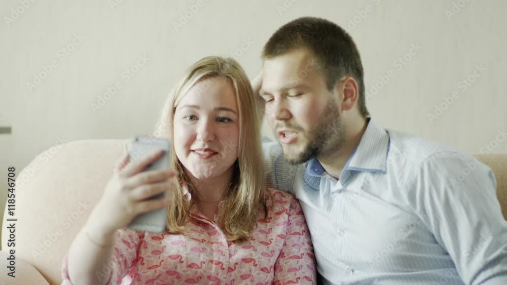 young couple talking on Skype young couple talking on Skype