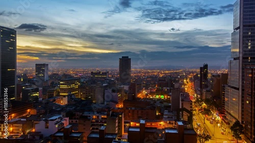 Day to night time lapse in Bogota, Colombia with the camera slowly zooming in photo