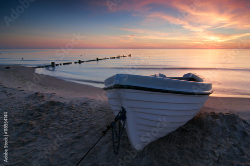 Coastal Sunrise, Fishing Boat on Sand Beach, Usedom Island, Germany 