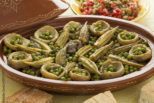 Moroccan tajine with meat, okra, green peas and artichoke hearts