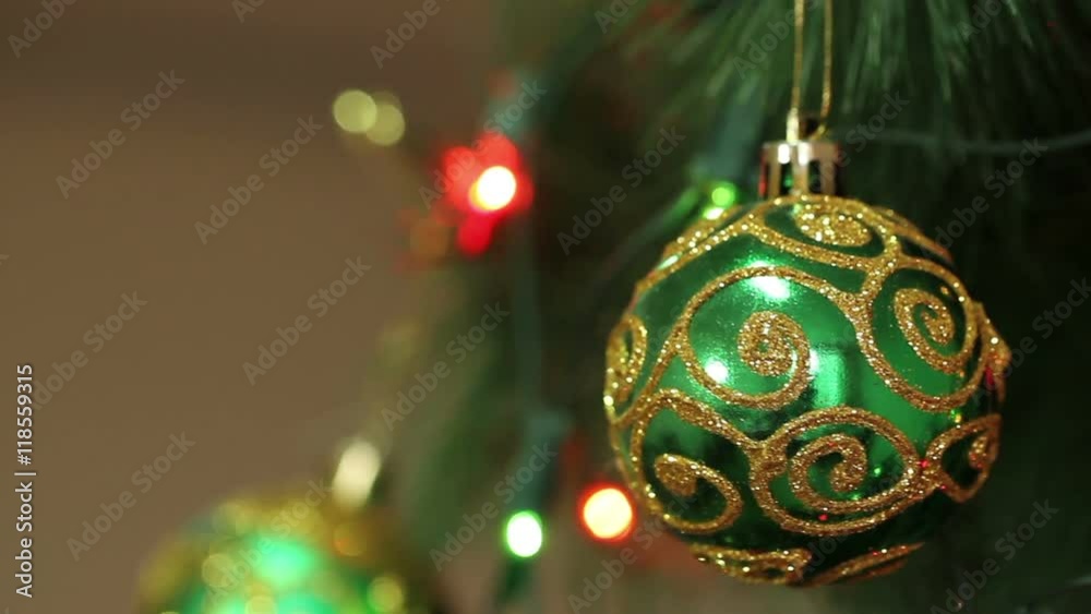 green ball with sparkles on a Christmas tree green ball with sparkles on a Christmas tree