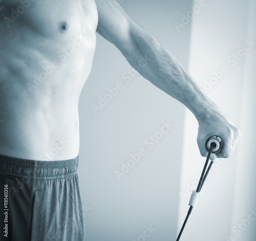 Man exercising with exercise bands