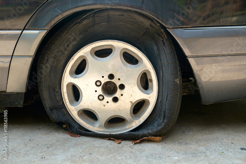 Flat tires / View of flat tires of car was abandoned.