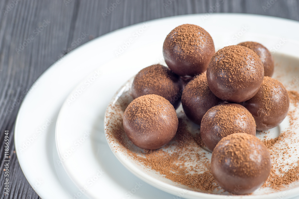 Assorted dark chocolate balls with cocoa powder Assorted dark chocolate balls with cocoa powder
