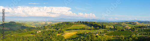 Wide panoramic landscape of surroundings of the medieval city of San Giminiano, Tuscany, Italy.
