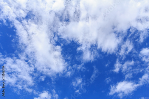 Blue sky with white clouds. The vast blue sky and clouds sky on sunny day. White fluffy clouds in the blue sky.