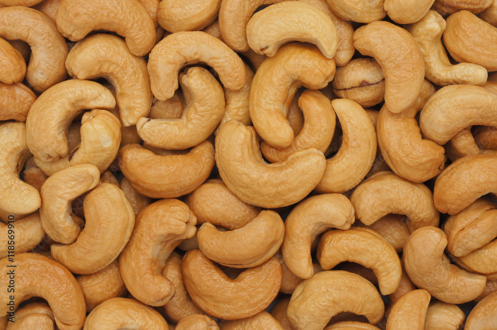 Close-up and detail of cashew seeds background Close-up and detail of cashew seeds background