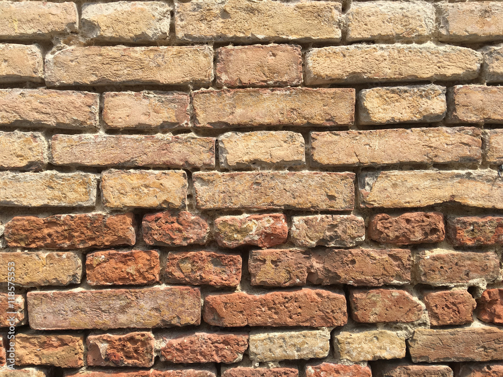 Aged brick wall, stone antique background, texture