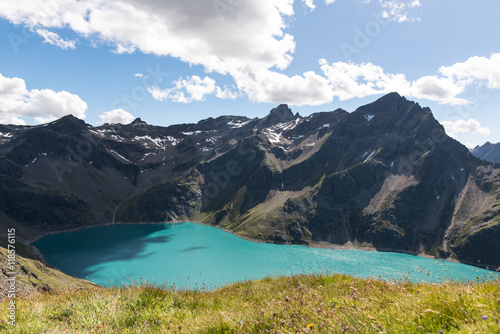 Turquoise barrier lake in the mountains of K  htai Tyrol Austria