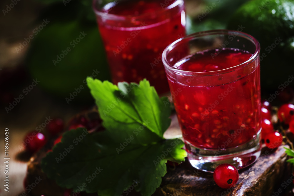 Lime lemonade with mashed red currants, selective focus Lime lemonade with mashed red currants, selective focus