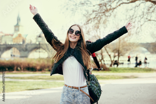 Photography Beautiful woman traveling in Europe and walking on park in Prague