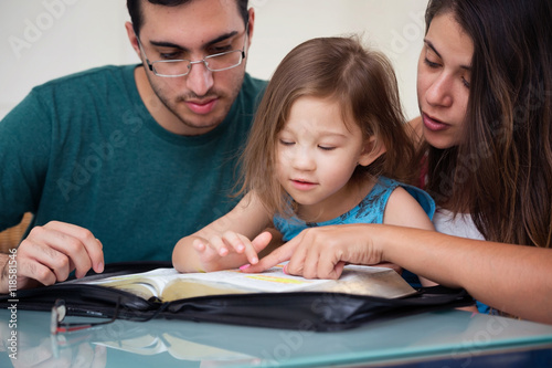 Family Reading the Bible Together