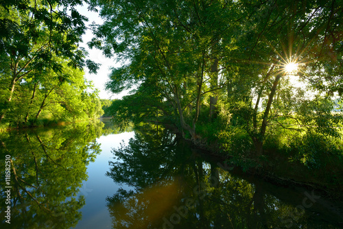Sunbeam on a Small River at Sunrise, River Unstrut, Germany
