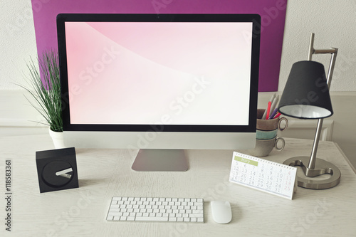 Stylish workplace with comp...