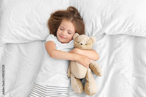 Cute little girl sleeping w...