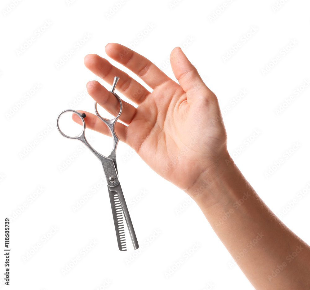 Hairdresser holding professional scissors on white background Hairdresser holding professional scissors on white background