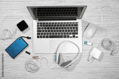 Laptop with accessories. Energy and information safety concept