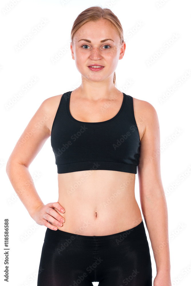 Beautiful young blonde woman. A young athletic woman in a sports suit Beautiful young blonde woman. A young athletic woman in a sports suit