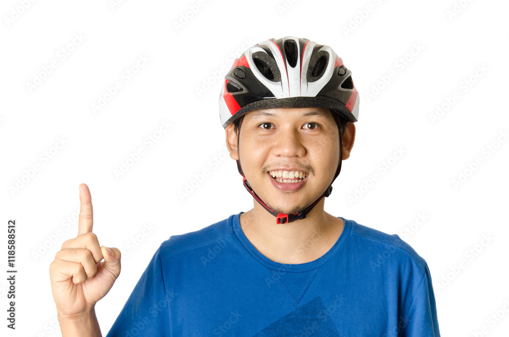 The man is wearing bike helmet and point to something,isolated on white background The man is wearing bike helmet and point to something,isolated on white background