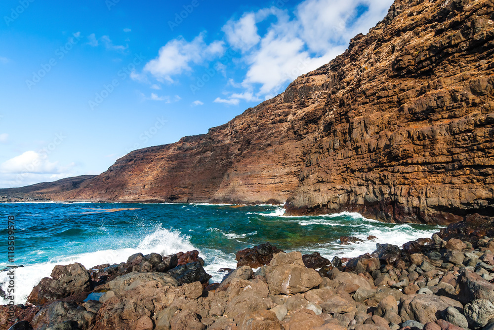 Beach light water in lanzarote isle foam rock spain landscape stone sky cloud. Lanzarote. Canary Islands. Spain