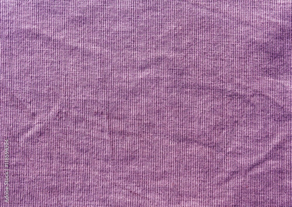 Fototapeta premium Grungy purple textile cloth texture.